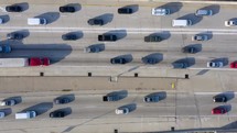 Aerial Drone Flight top down View of freeway busy city rush hour heavy traffic jam highway.