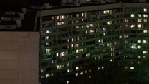 Time lapse windows of building at night