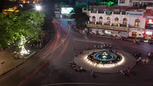 Time lapse shot of circular intersection at night