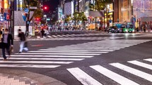 TOKYO - OCT 27th, 2022: People and traffic cross an intersection in Ginza retail district in Tokyo, Japan