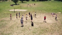 teens playing volleyball and soccer