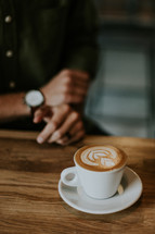 wheat design in a creamer in coffee 
