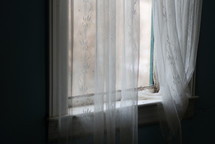 sheer curtains in a window 