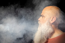 bearded man in smoke 