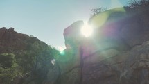 rocky cliffs and intense sunlight