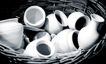 basket of pottery pots 