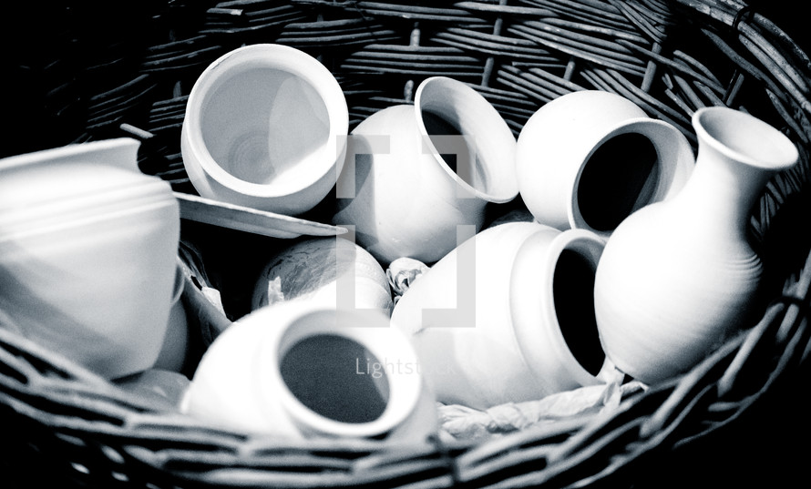 basket of pottery pots 