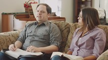 a couple in a discussion at a Bible study