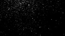 Real snow falling over black background.