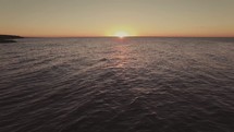 ocean water surface at sunset 