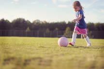 child with a soccer ball 