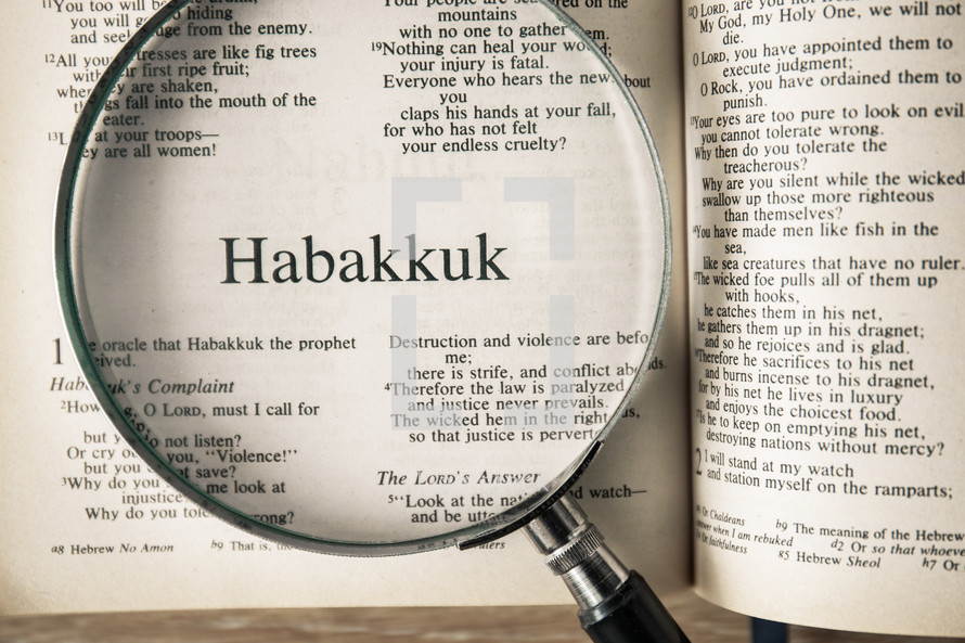 magnifying glass over Bible - Habakkuk 
