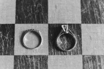wedding rings on a checker board 