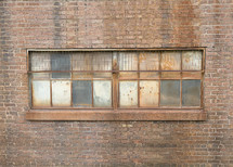 warehouse window and exterior brick wall 