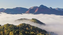 Aerial view of foggy autumn forest in mountains landscape nature Time-lapse, Hyper-lapse
