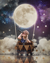 a child in a hot air balloon with a telescope 