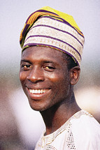 Happy African man in traditional garments {Also try search for 'Ethnic Faces'}