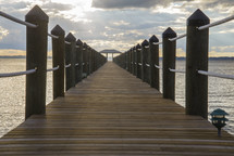 view down a long pier 