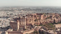 Fly over Mehrangarh fort overseeing the city of Jodhpur, Rajasthan, India