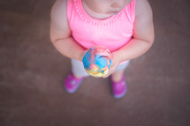 toddler holding an ice cream cone 