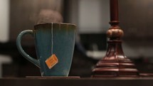 steam rising from a mug of hot tea 