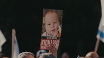 Signs held up of two kidnapped children
