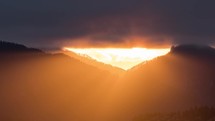 Orange sunlight of Fast sunset in summer mountain landscape, power of nature time lapse
