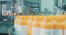 Machines in an automated chemical bottles production line