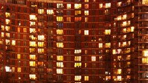 day to night time-lapse of an apartment building