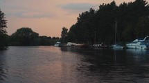 The Norfolk Broads, river landscape setting with pleasure boats and yachts, sailing river setting