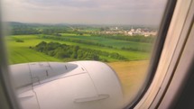 Sunset and Journey from the Airplane Window. Plane Flights Over Fluffy Clouds. Passenger window panorama view.