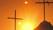 Crucifixes silhouette at sunrise light
