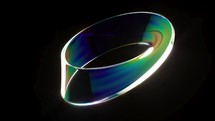 Holography An endless Mobius strip rotate on black back able to loop seamless