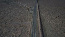 aerial view over a desert highway 