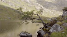 Fly Fishing in a Mountain Lake Surrounded By Beautiful Landscape