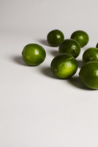 A bunch of limes isolated on white