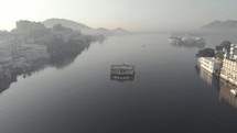 Mystical mood of Lake Pichola and islands palaces, Udaipur, India. Scenic aerial