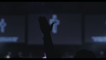 raised hand during a worship service 