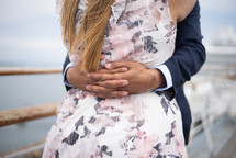 couple hugging on a ship 