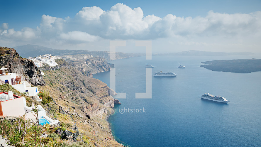 cruise ships and Santorini coastline 