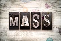 word mass on wood background 