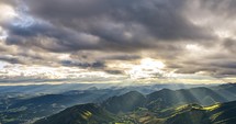 Magic sunset with clouds and golden light of sun motion fast in summer nature Time lapse
