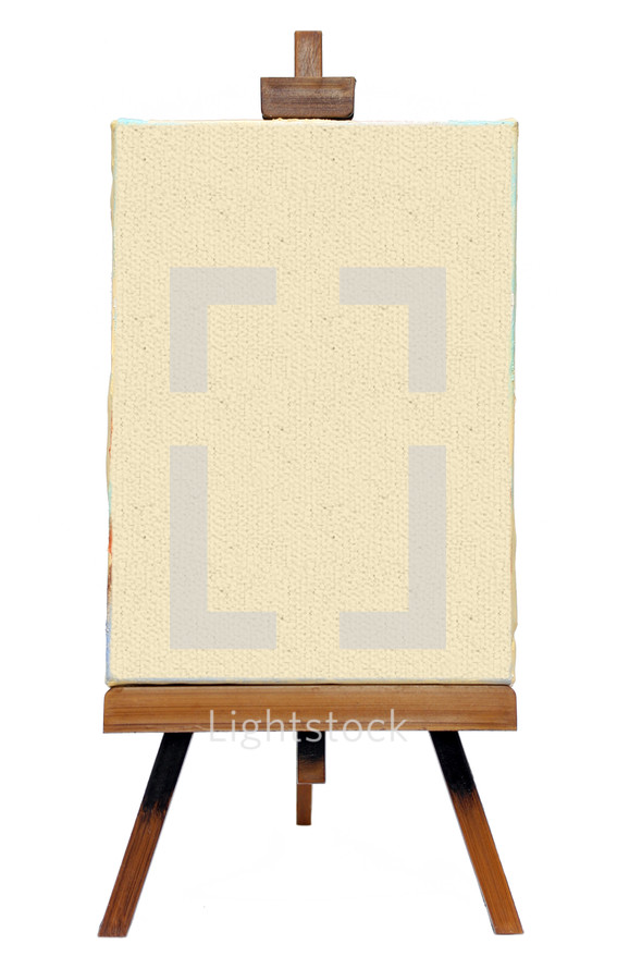 Old Easel with canvas isolated on white background