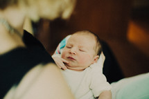mother holding a newborn 