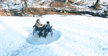 conversation on a frozen lake 