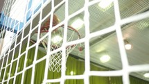 basketball going into a net 