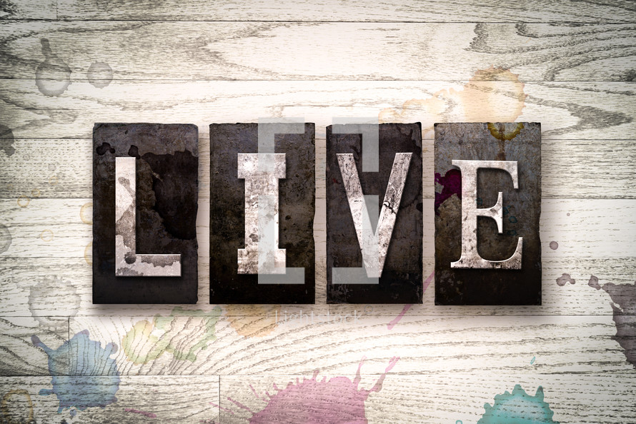 word live on wood background 