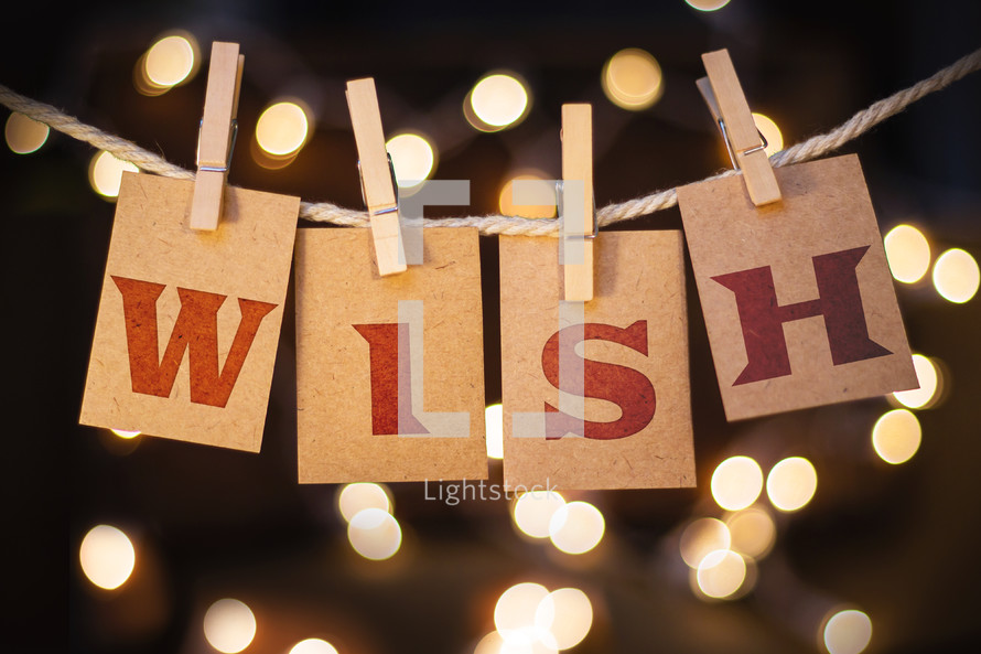 word wish hanging on clothes pins 