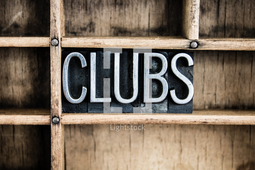 word clubs in blocks on a shelf 