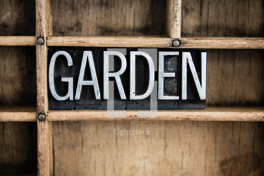 word garden in blocks on a shelf 